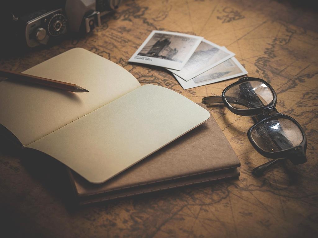 Person using digital planning tools on tablet for weekend trip
